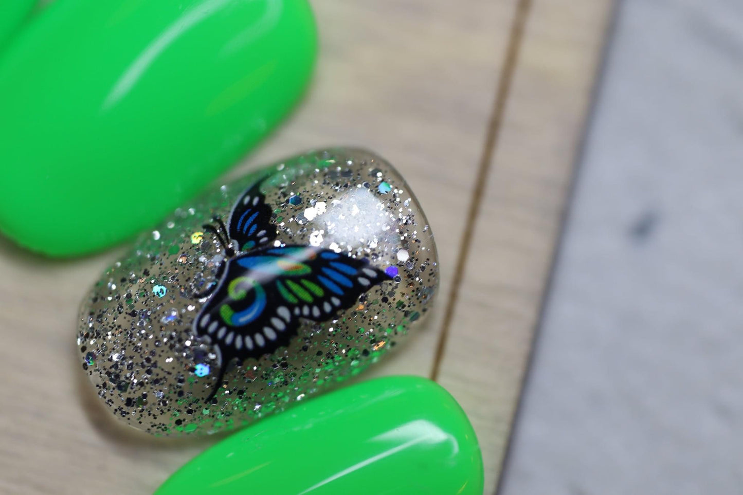 GREEN GLITTER BUTTERFLY NAIL ART